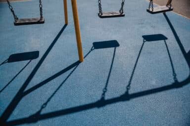 Shadows of swings on a playground